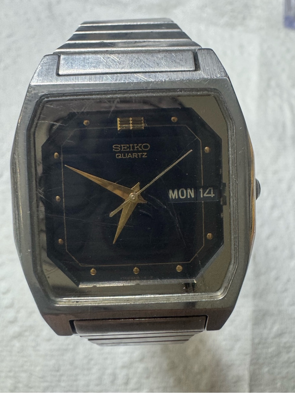 Seiko Black Dial Stainless Steel Watch with Gold Accents